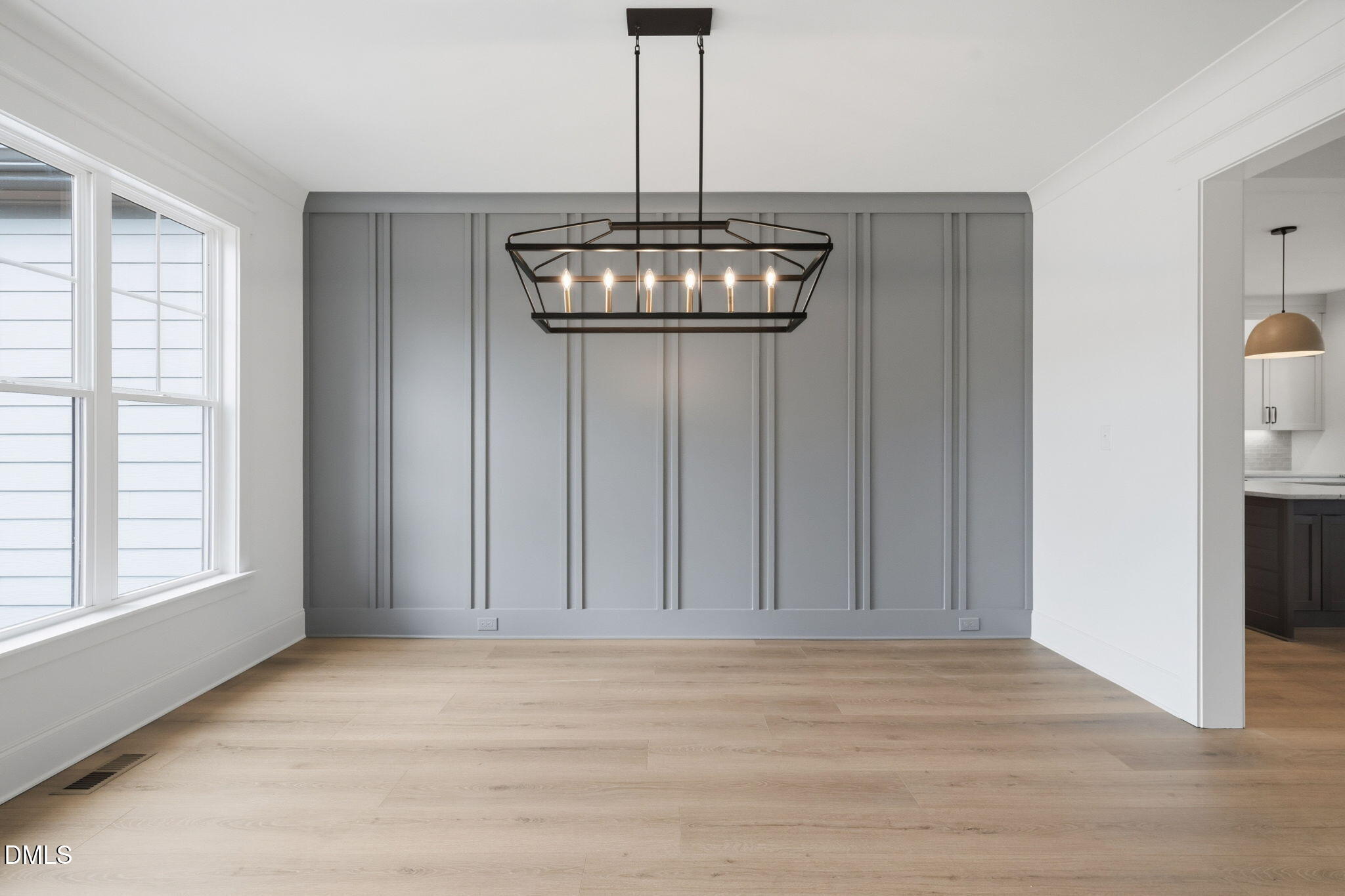 11214 Old Beulah Road Kenly, NC 27542 - Photo 9 of 56 a view of wooden floor and windows in a room