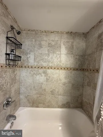 a bathroom with a bathtub