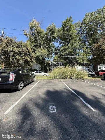 a view of a street with cars