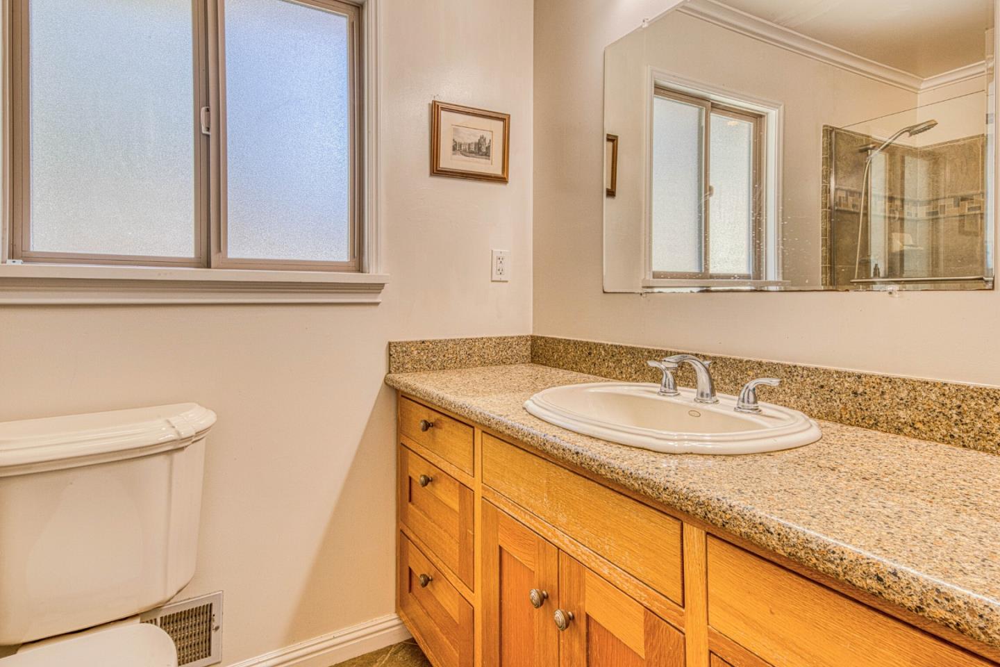 394 Mesa Road Salinas, CA 93908 - Photo 27 of 53 a bathroom with a sink and a mirror