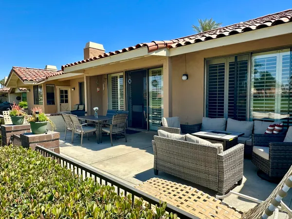 a view of a house with patio