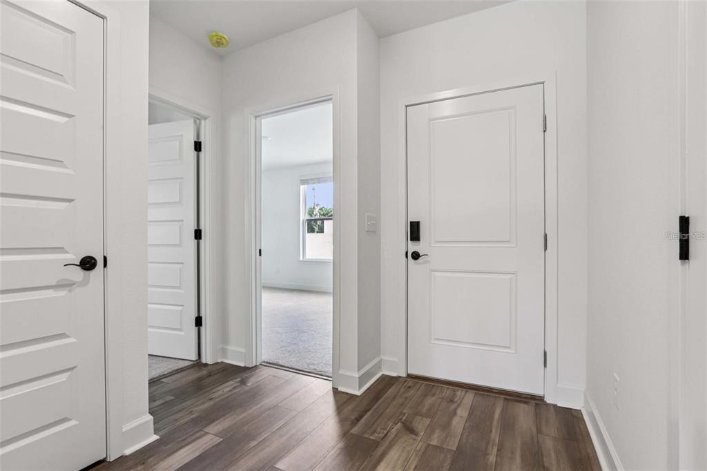 13112 Siam Drive Spring Hill, FL 34609 - Photo 4 of 46 wooden floor in an empty room