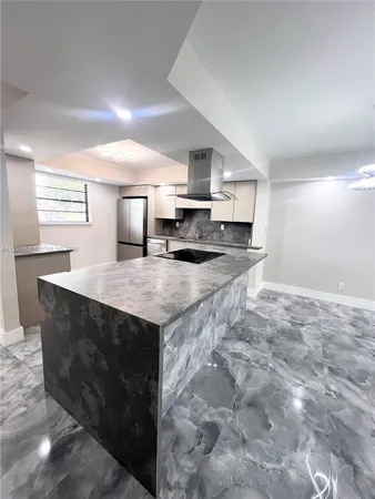 $235,000 | 4930 East Sabal Palm Boulevard, Unit 206, Tamarac, FL 33319