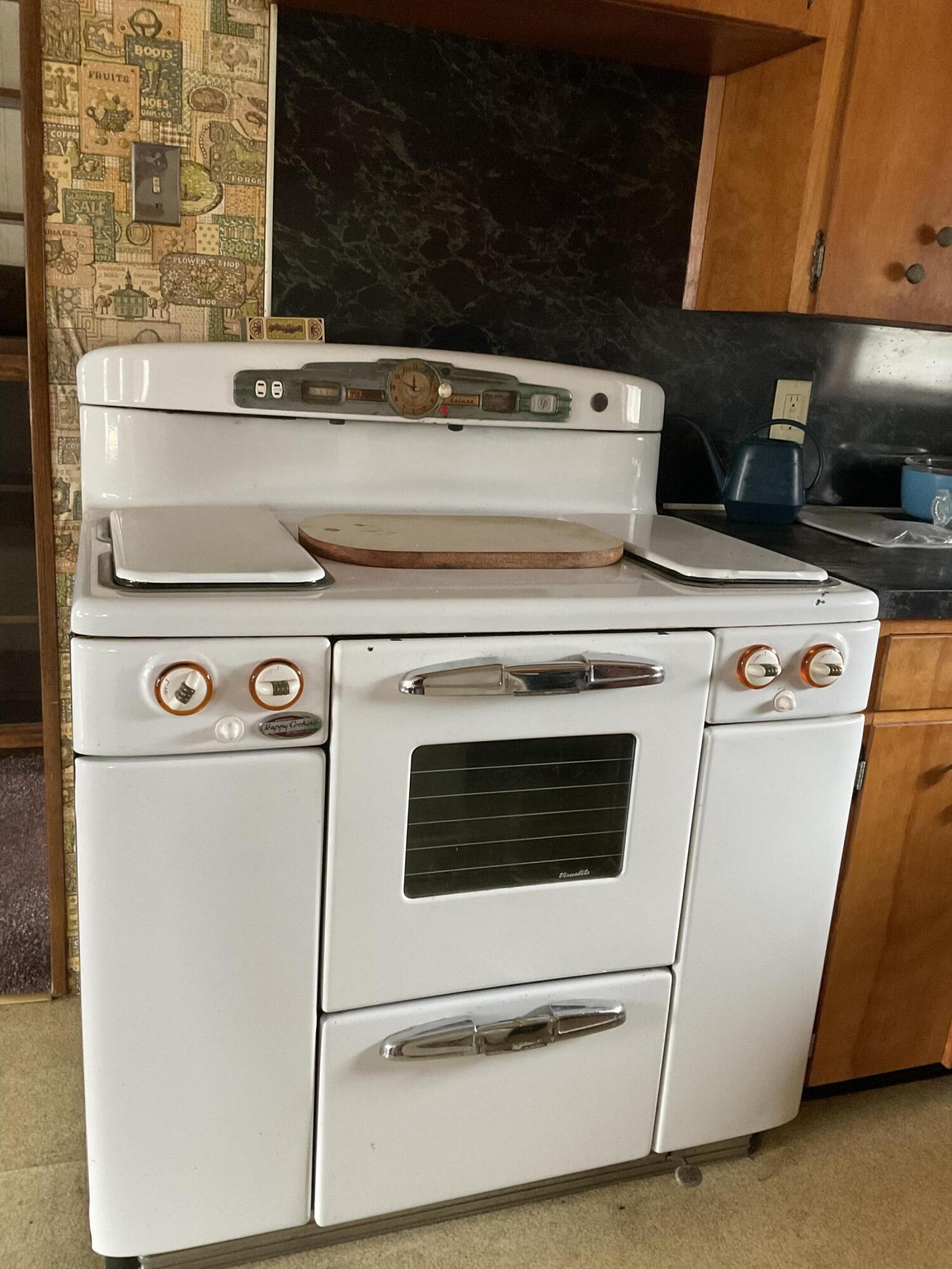 144 Pondview Street Limestone, ME 04750 - Photo 17 of 41 Antique gas stove