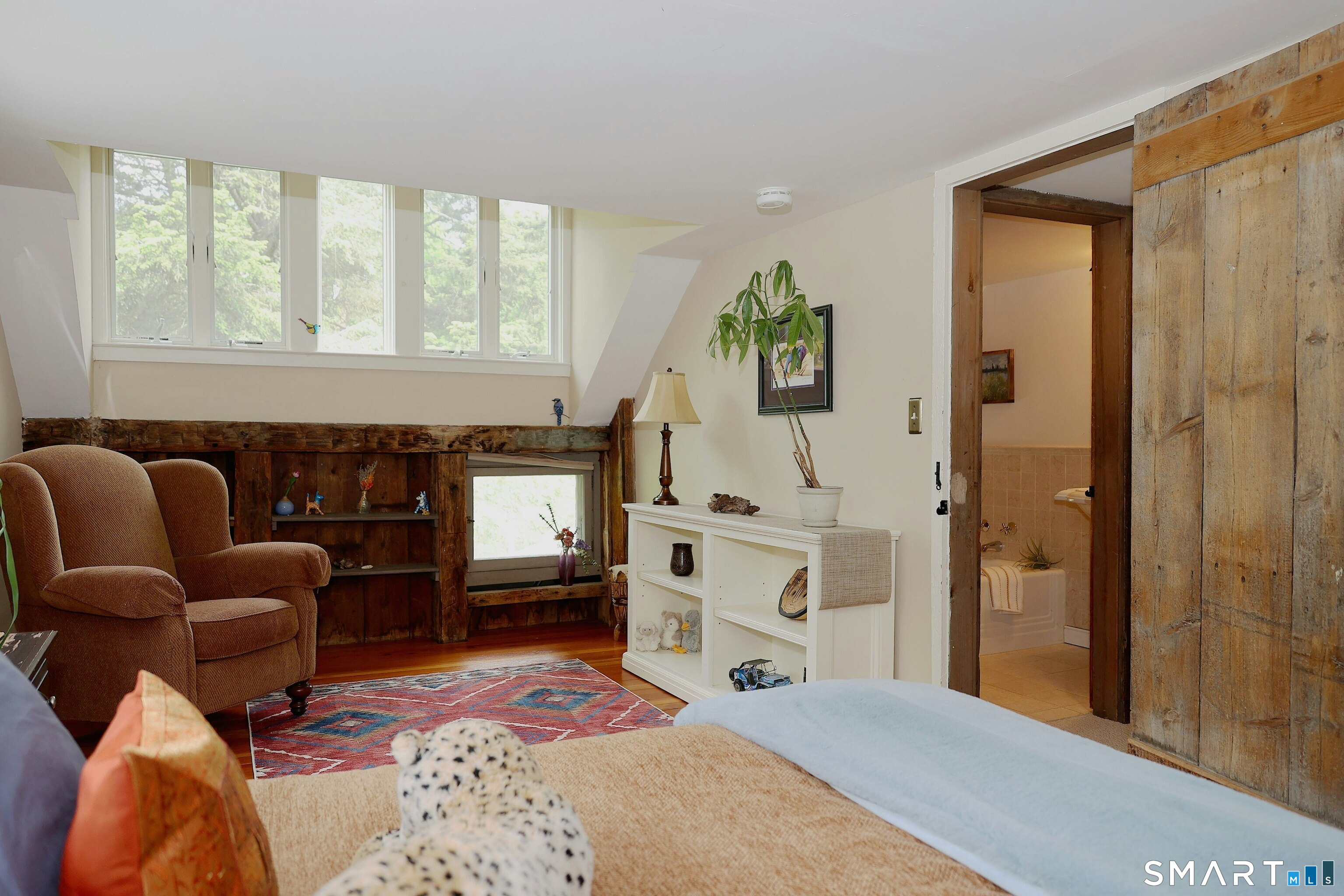 68 Bloomer Road Ridgefield, CT 06877 - Photo 33 of 40 a spacious bedroom with a bed and furniture