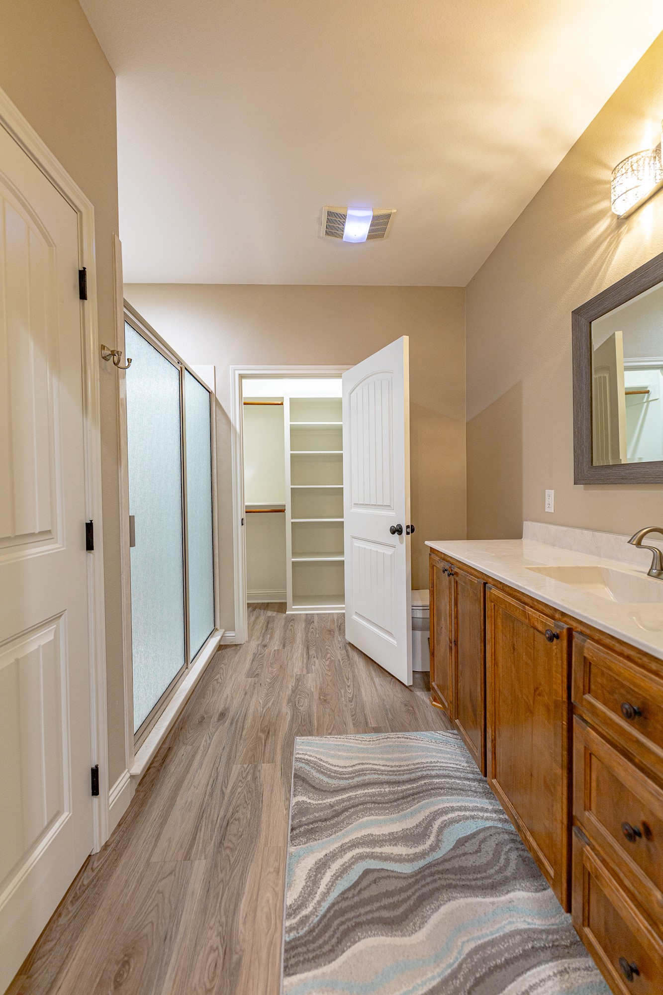 716 L Hrabovsky Road Yoakum, TX 77995 - Photo 11 of 42 a view of a kitchen with wooden floor and a sink
