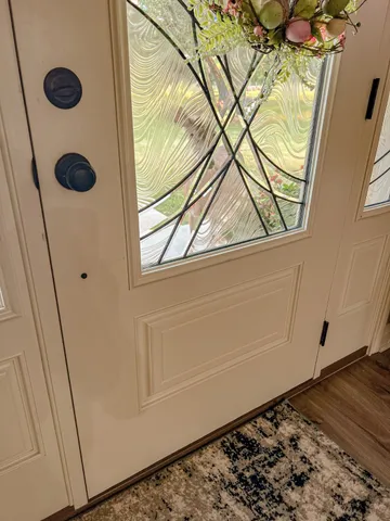 a close view of a door and a window