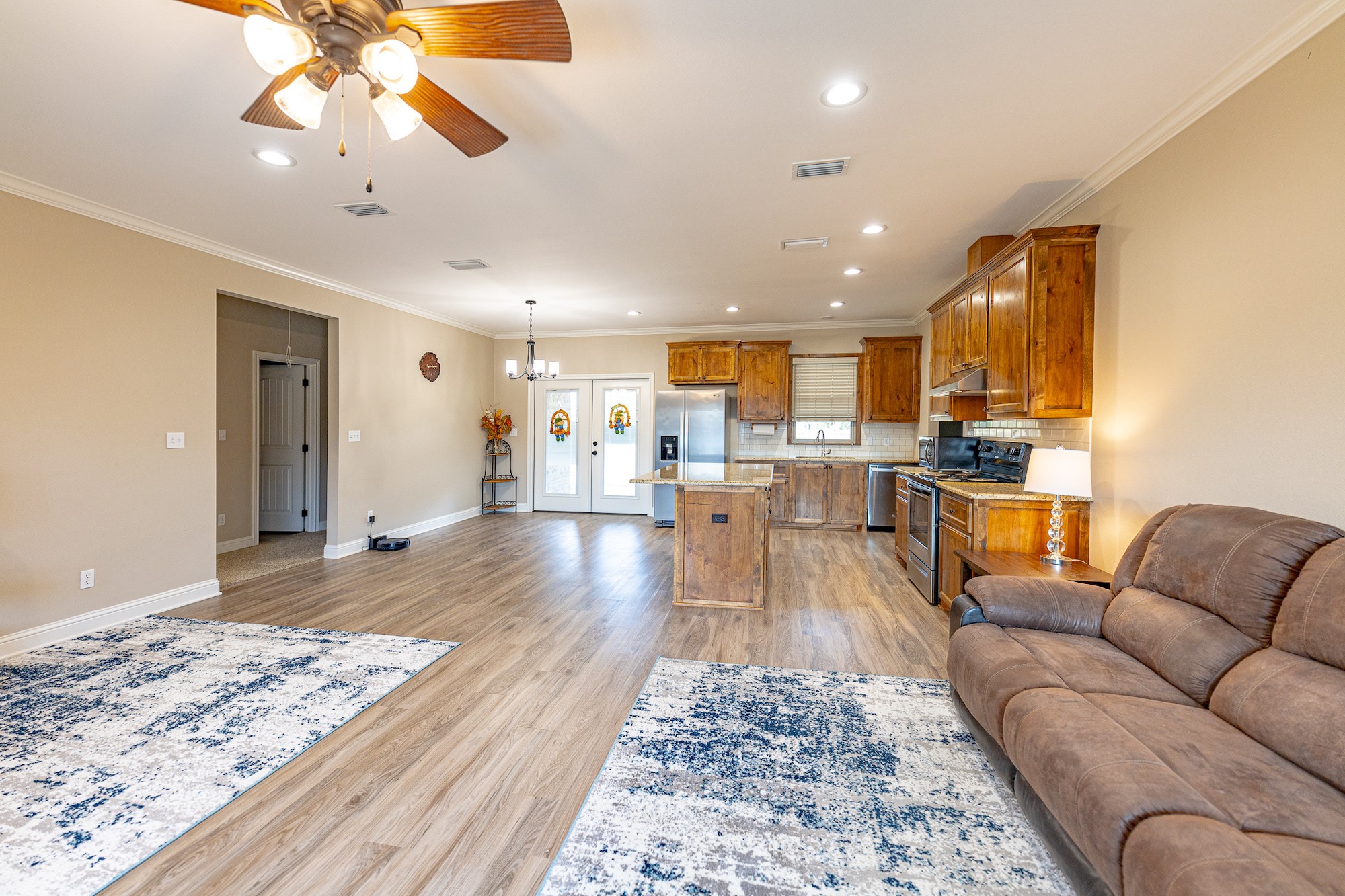 716 L Hrabovsky Road Yoakum, TX 77995 - Photo 4 of 42 a living room with furniture and kitchen view
