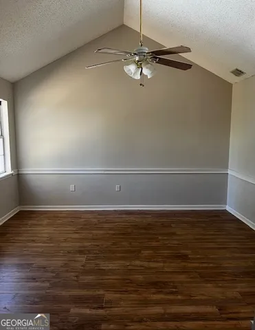 a view of a room with an empty space