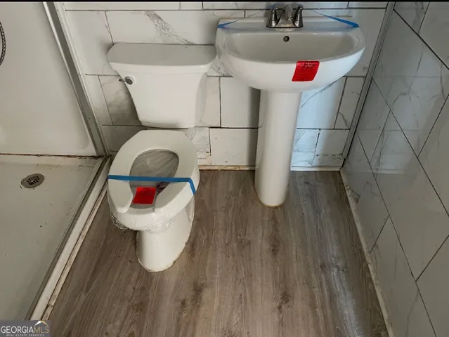 a bathroom with a sink and mirror