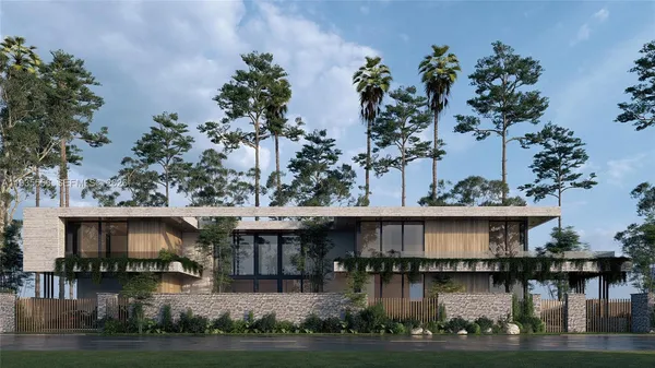 an aerial view of a house with swimming pool and outdoor seating
