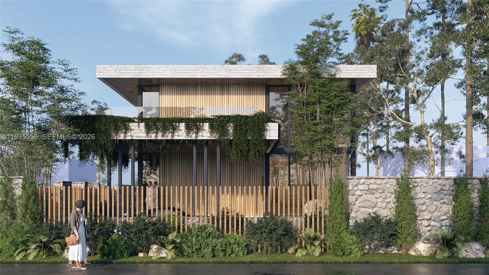 3700 Loquat Avenue Miami, FL 33133 - Photo 3 of 8 a view of a house with brick walls