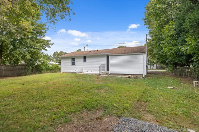 a backyard of a house with lots of green space