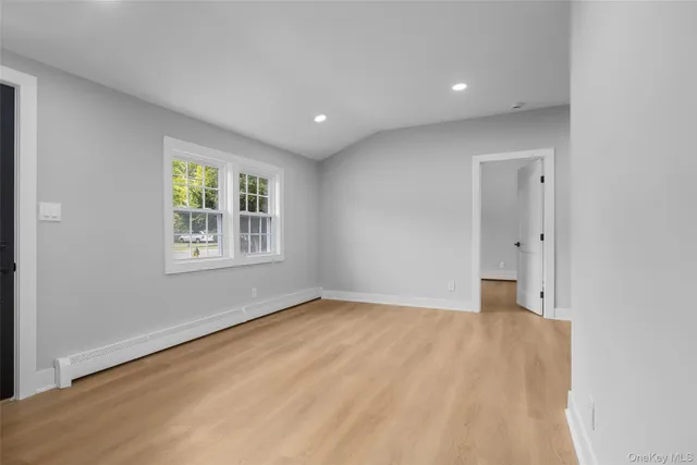 an empty room with windows