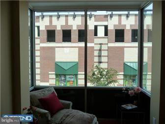 920 South Street, Unit 2 Philadelphia, PA 19147 - Photo 7 of 11 a living room with windows
