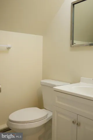 a bathroom with a toilet and a sink