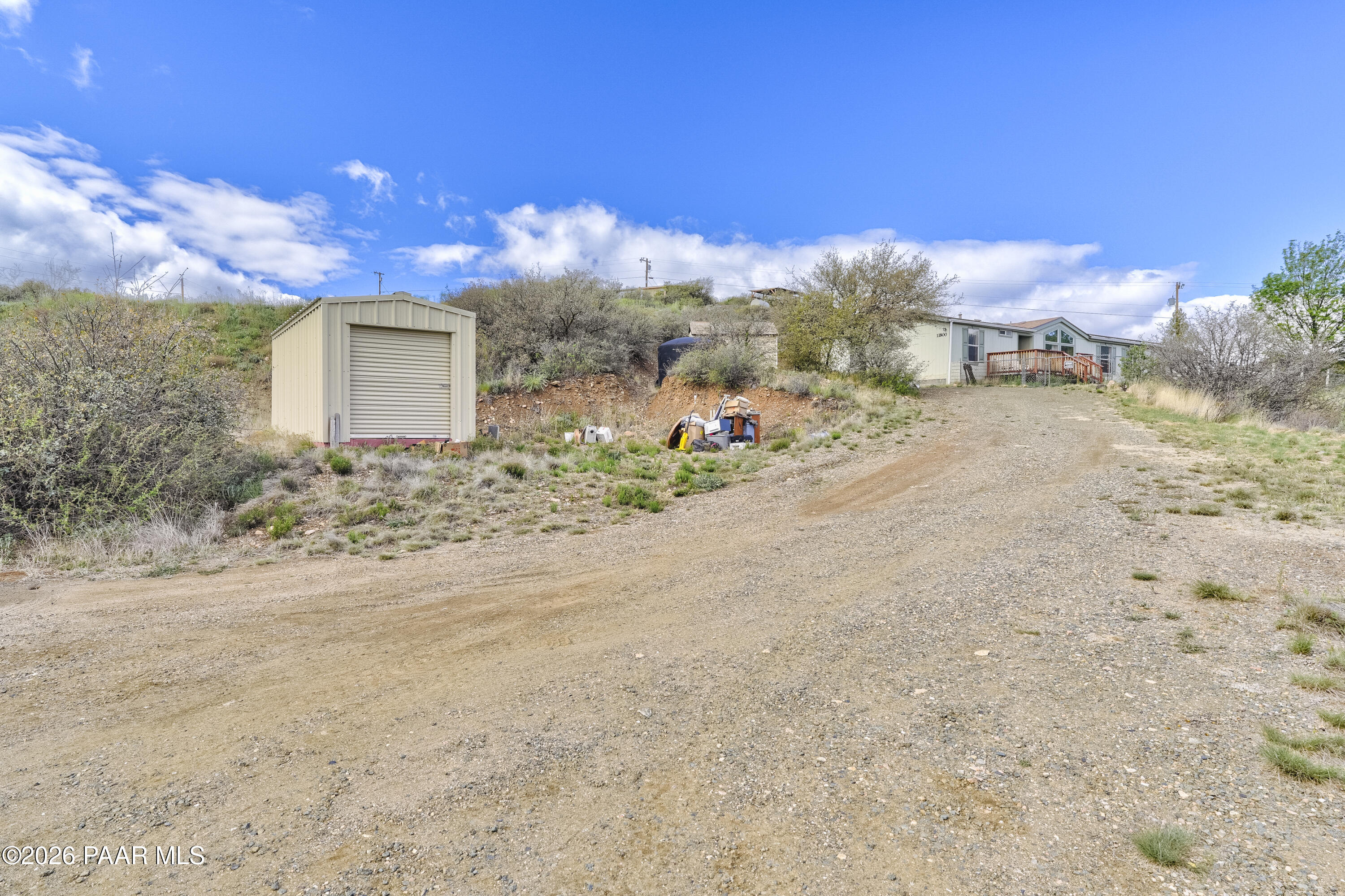 11800 Henderson Road Dewey-Humboldt, AZ 86327 - Photo 40 of 54 a view of a road with a building in the background