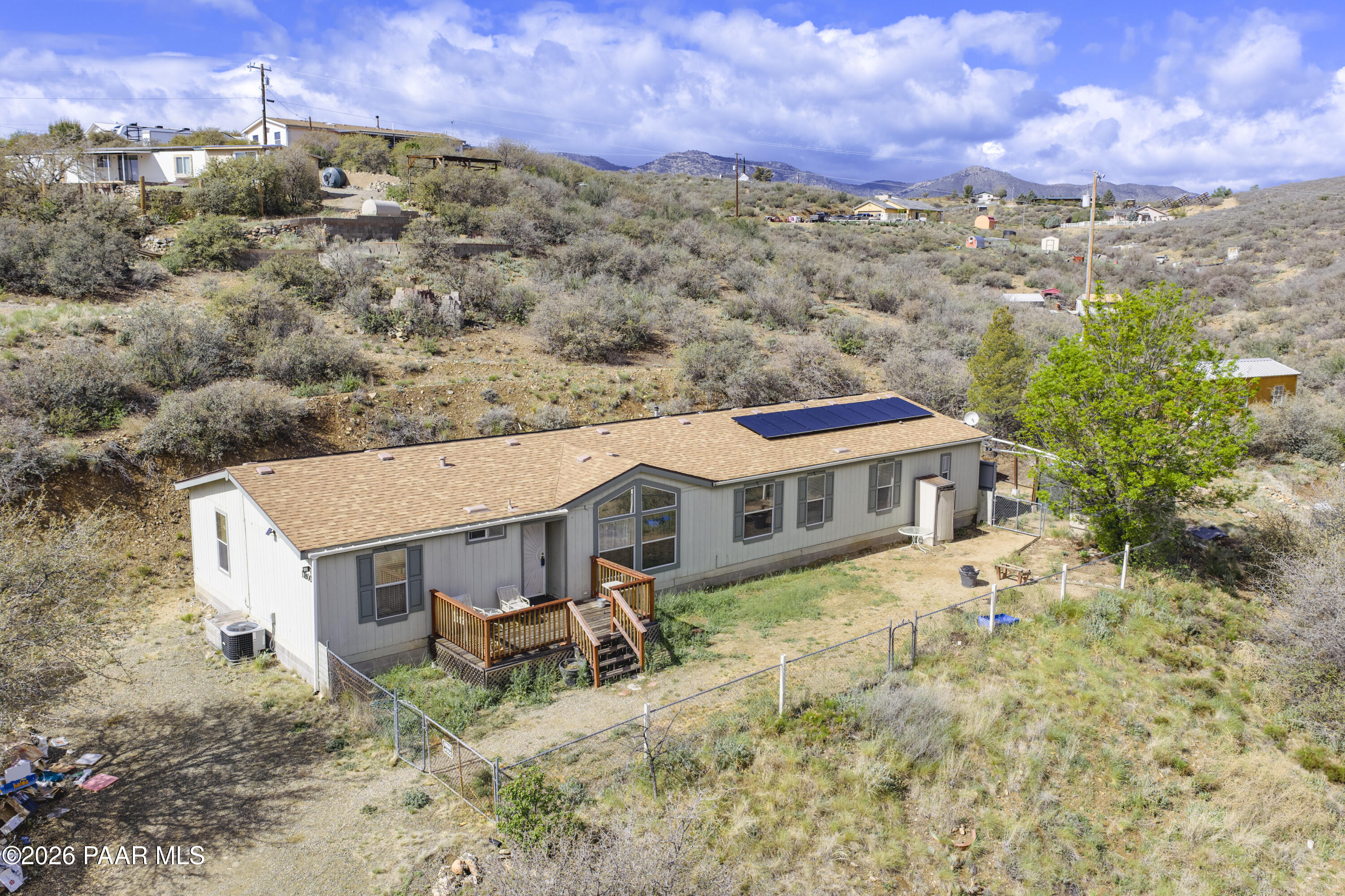 11800 Henderson Road Dewey-Humboldt, AZ 86327 - Photo 42 of 54 a view of a house with a yard