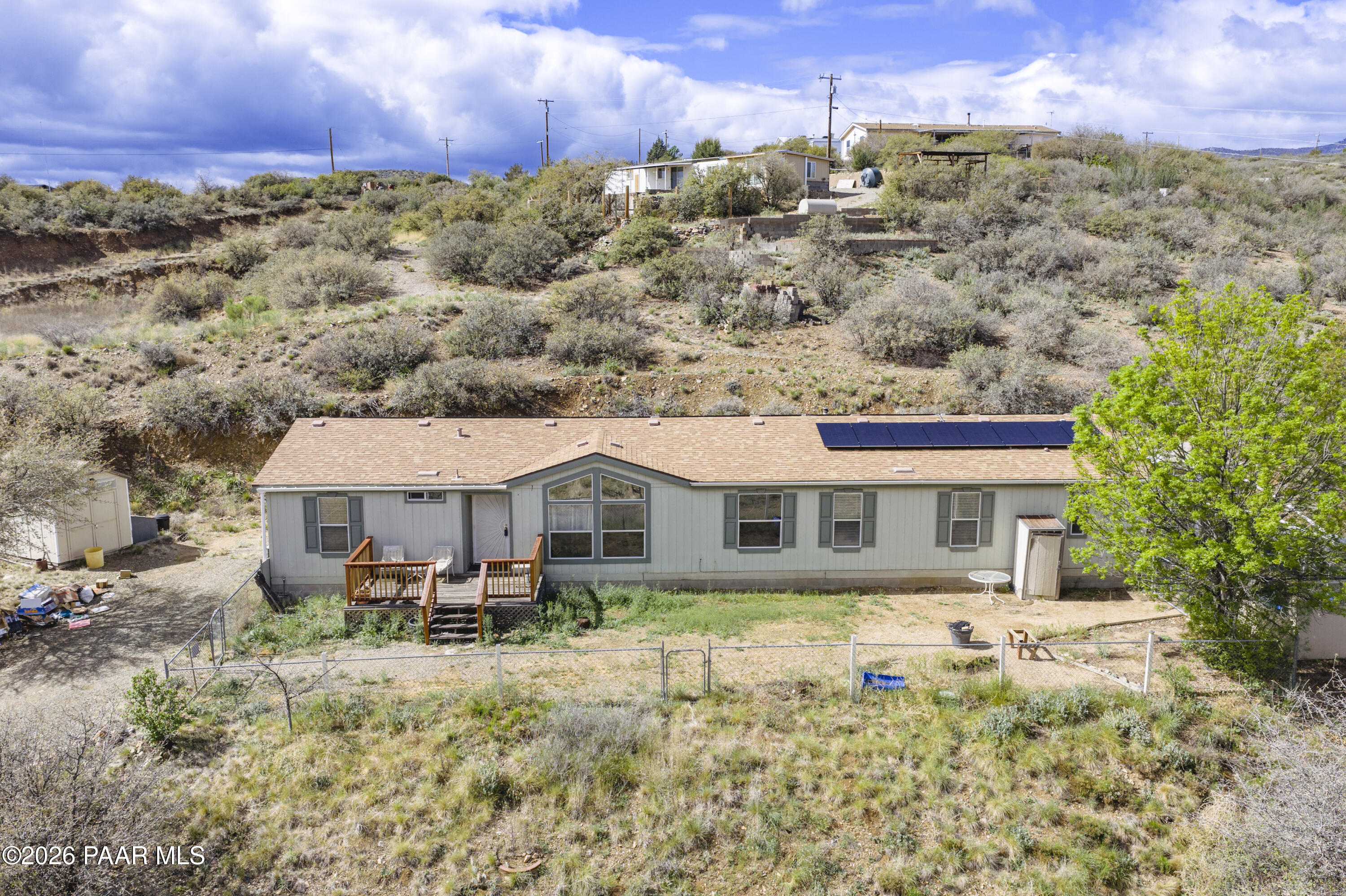 11800 Henderson Road Dewey-Humboldt, AZ 86327 - Photo 44 of 54 a front view of a house with a yard