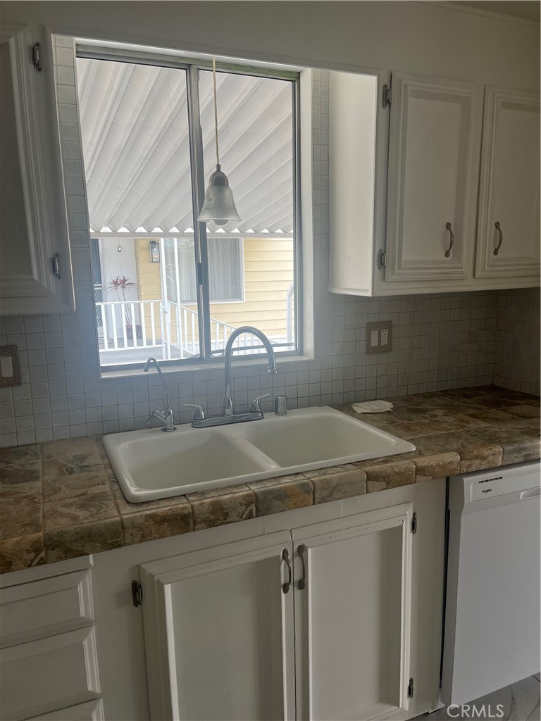 3950 Via Real, Unit 91 Carpinteria, CA 93013 - Photo 14 of 39 a kitchen with a sink and a window