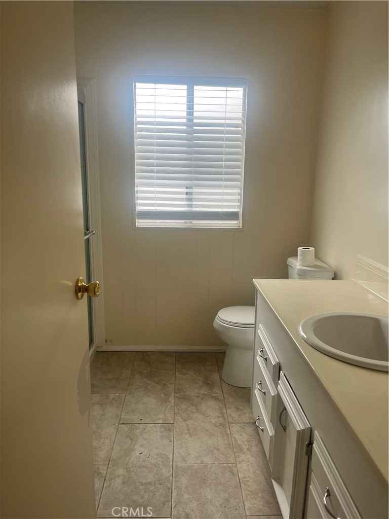 3950 Via Real, Unit 91 Carpinteria, CA 93013 - Photo 20 of 39 a bathroom with a toilet sink and window