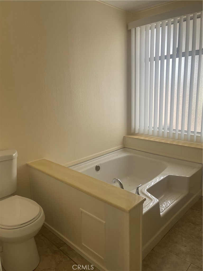 3950 Via Real, Unit 91 Carpinteria, CA 93013 - Photo 22 of 39 a bathroom with a sink and a toilet