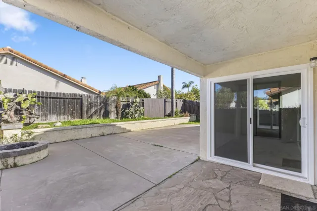 a view of a house with a outdoor space and porch