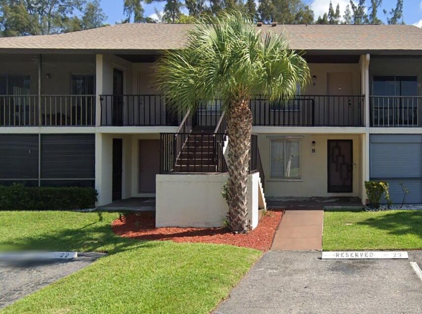 a front view of house with yard