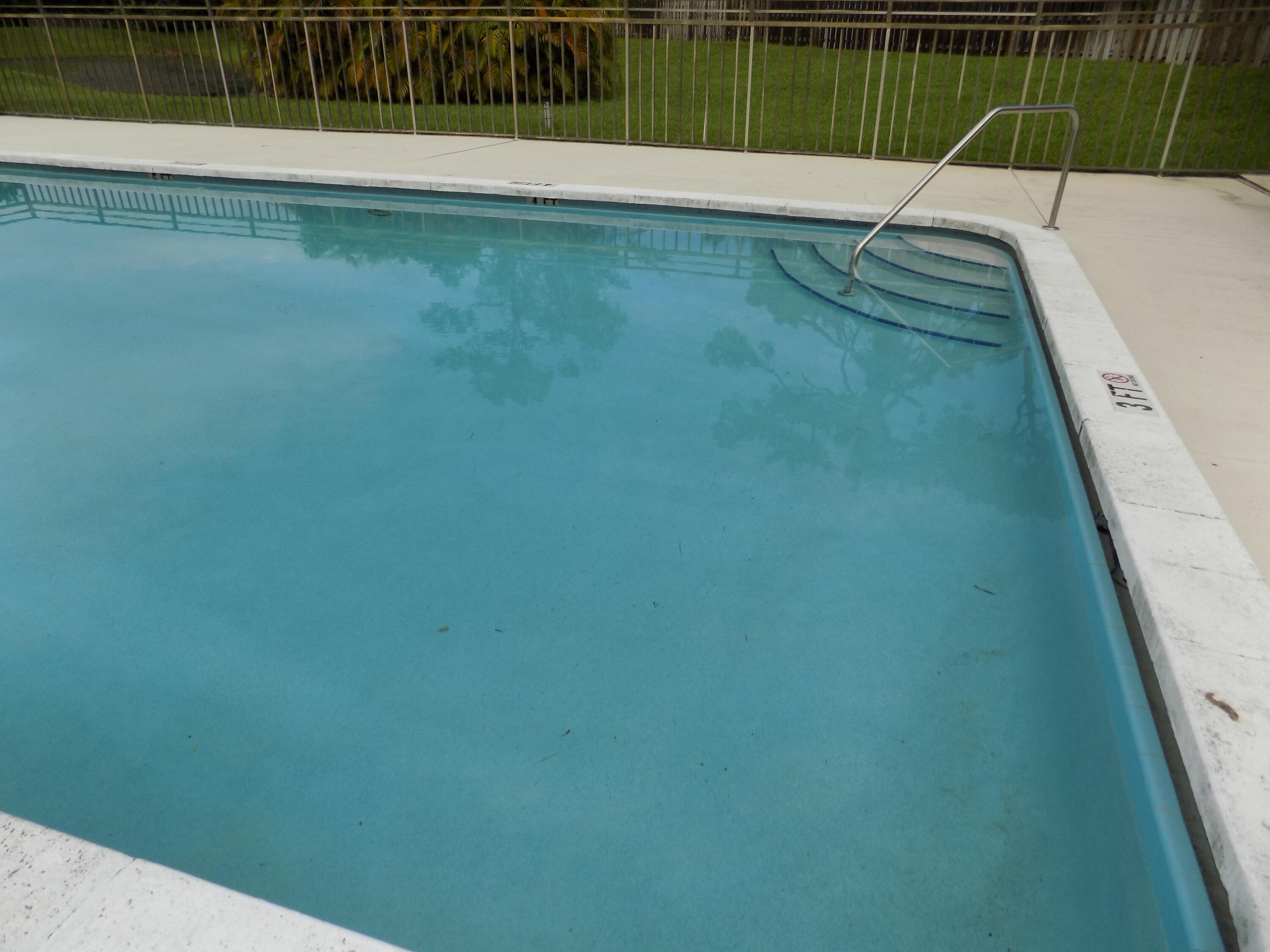 4181 South 57th Avenue, Unit B Greenacres, FL 33463 - Photo 24 of 25 a view of a back yard