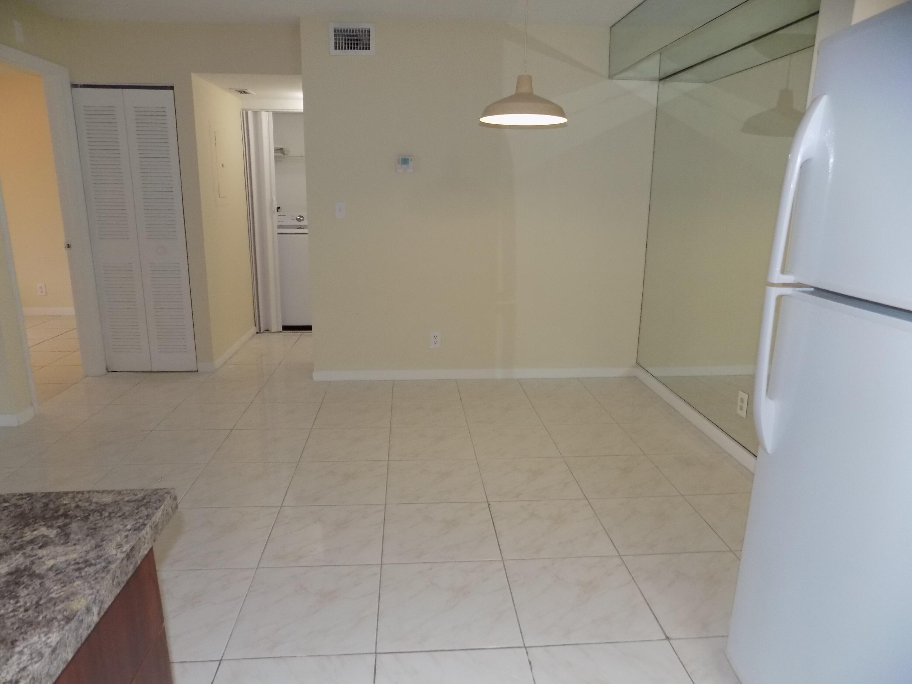 4181 South 57th Avenue, Unit B Greenacres, FL 33463 - Photo 8 of 25 a view of an empty room