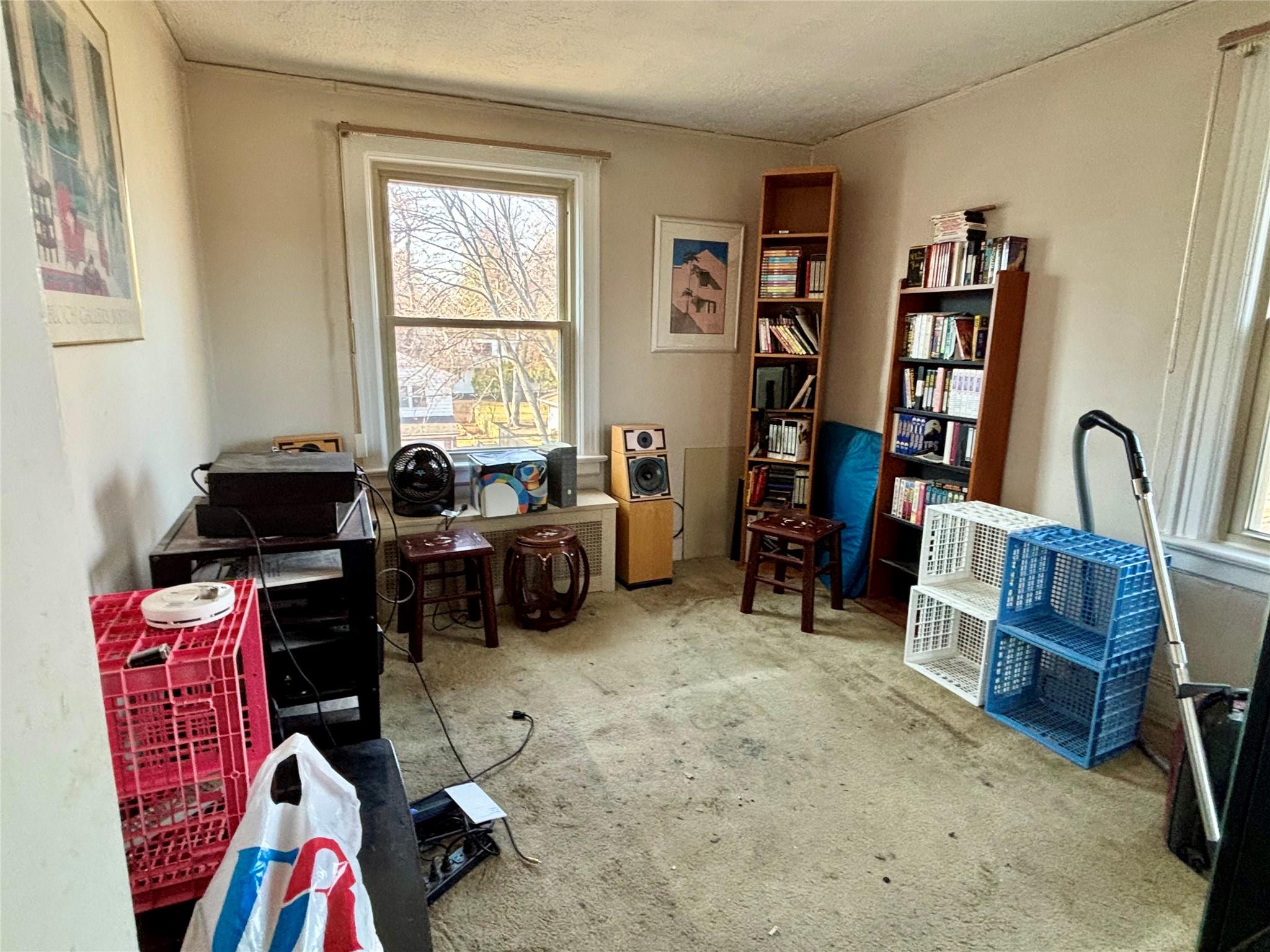 1 Ascot Ridge, Unit 3A Great Neck, NY 11021 - Photo 9 of 10 a view of a workspace with furniture and a window