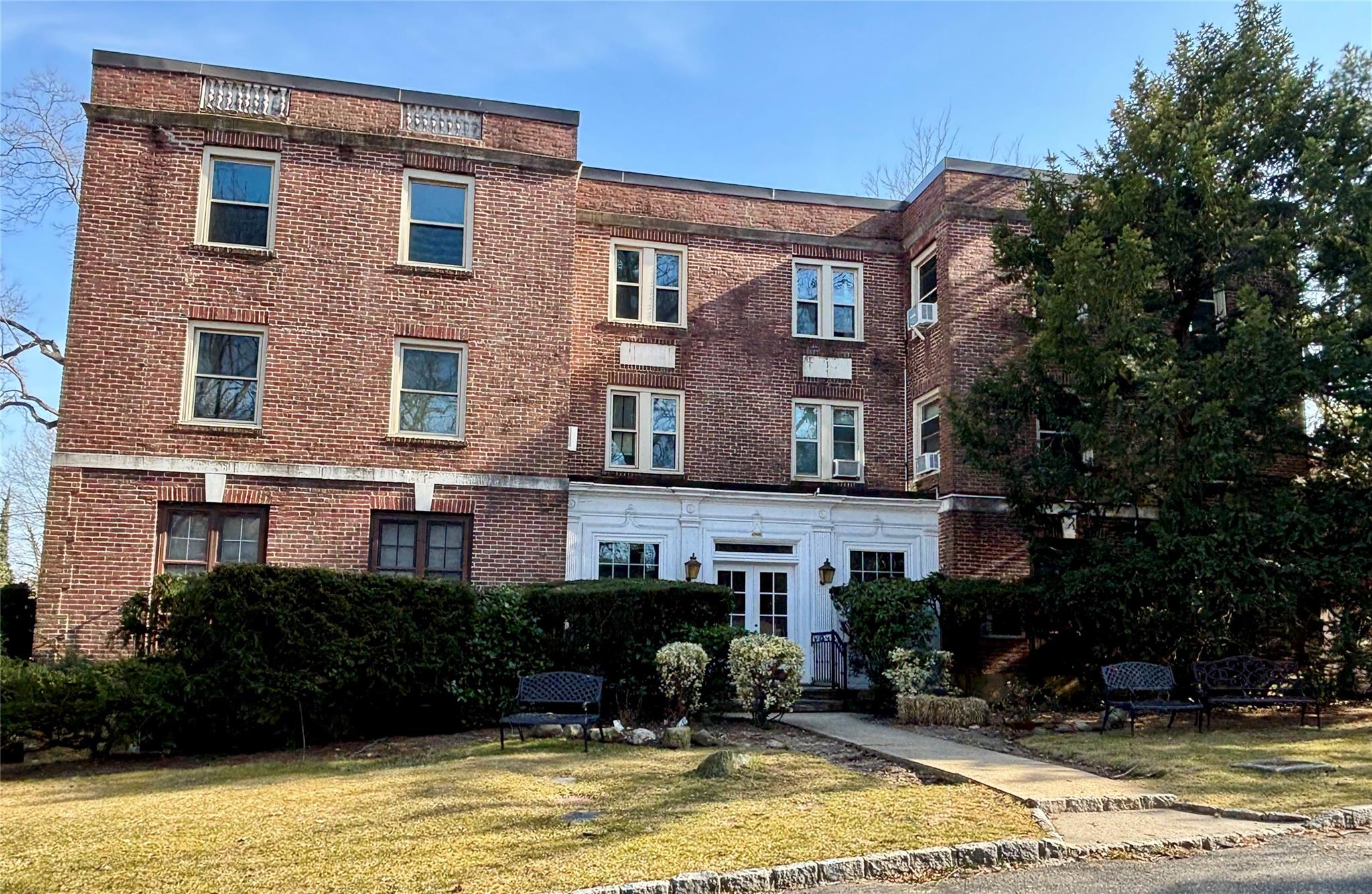 1 Ascot Ridge, Unit 3A Great Neck, NY 11021 - Photo 10 of 10 a house view with a garden space