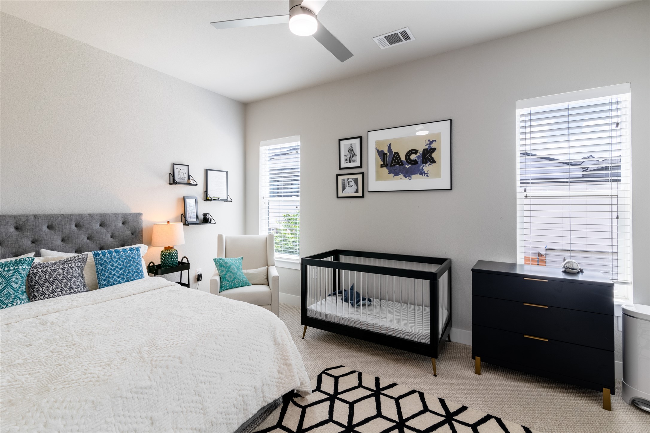6025 Seville Drive Austin, TX 78724 - Photo 24 of 40 2 of 2 second floor guest bedroom featuring a ceiling fan