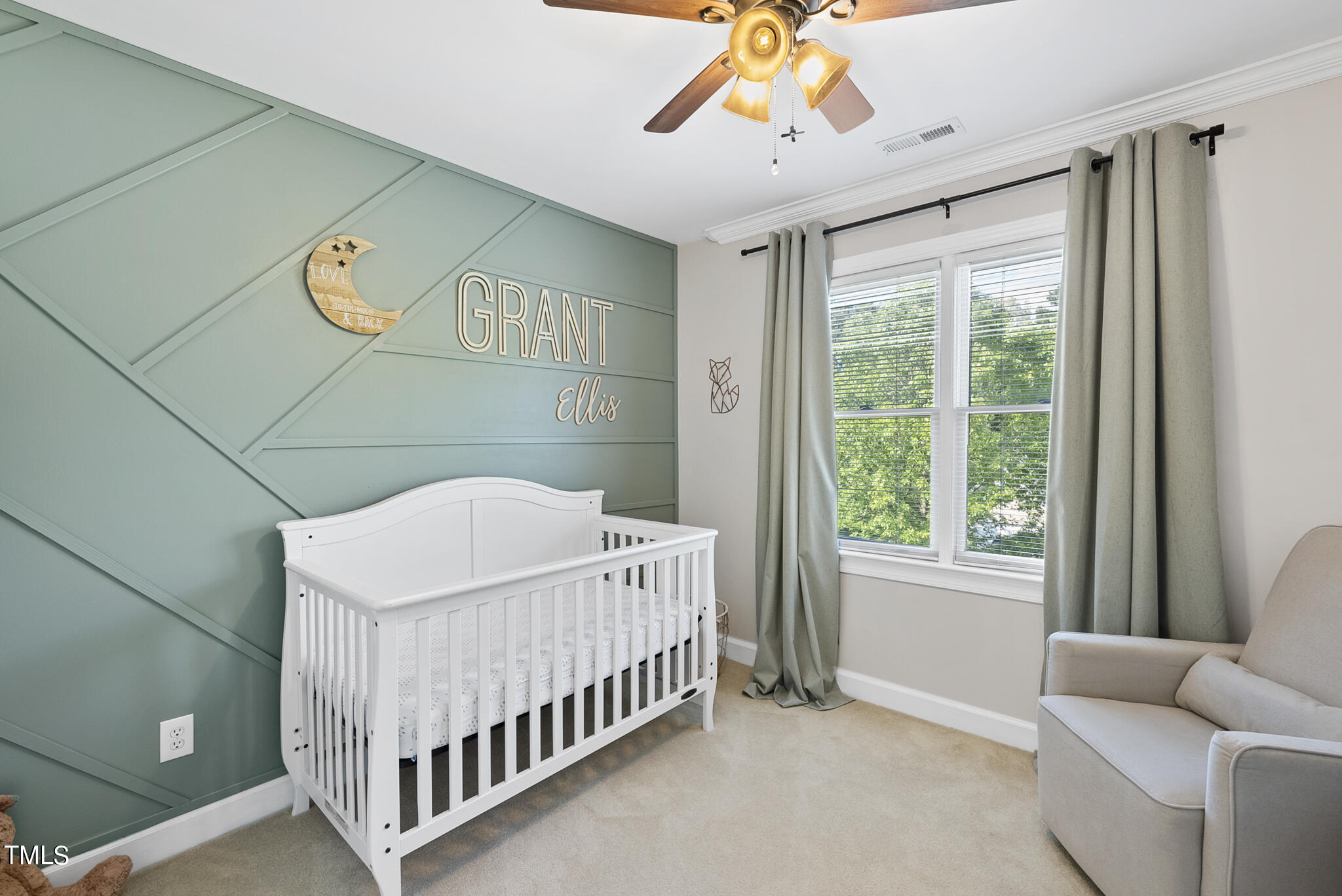 2821 Dahlgreen Road Raleigh, NC 27615 - Photo 14 of 28 a bedroom with a bed and a window