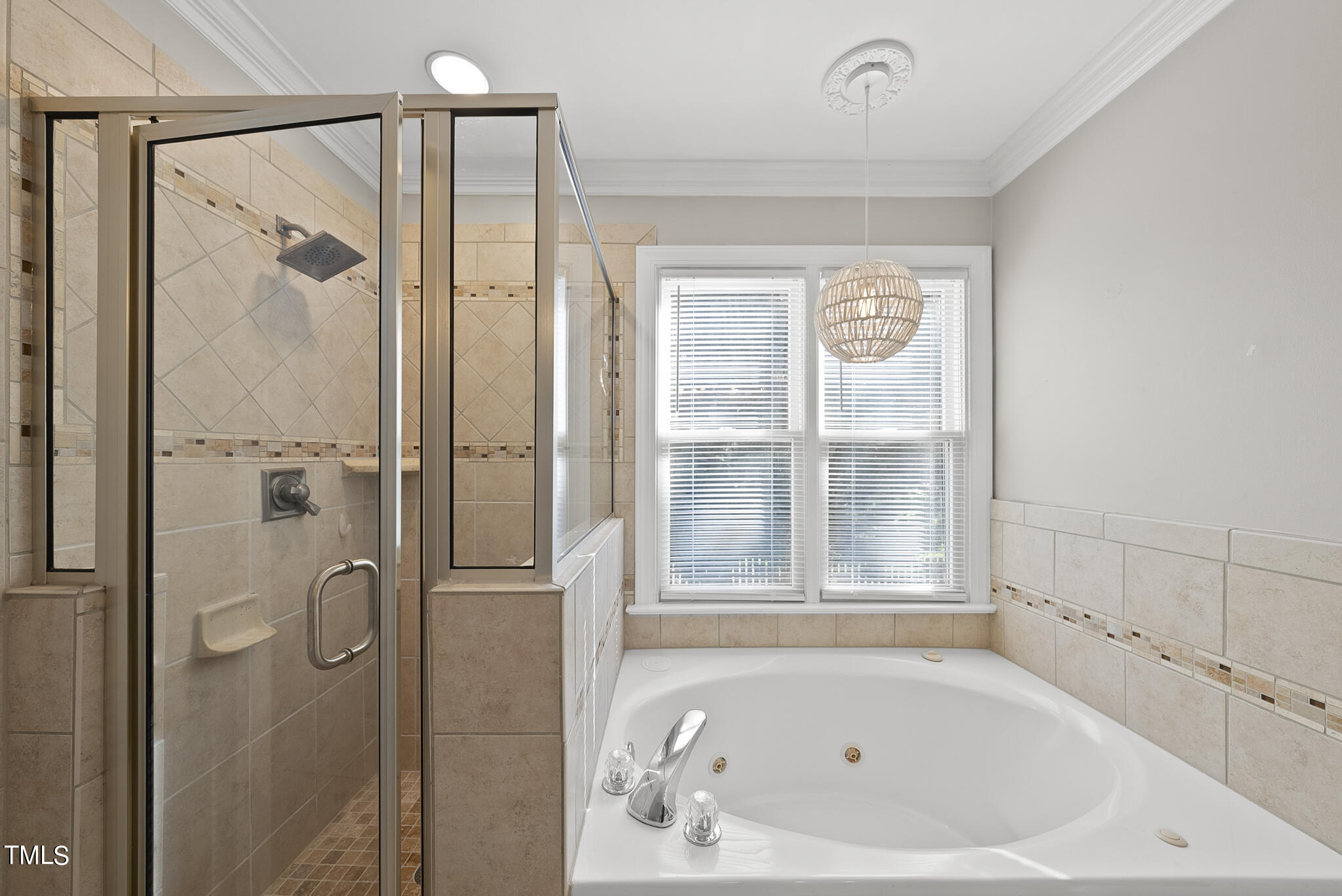 2821 Dahlgreen Road Raleigh, NC 27615 - Photo 21 of 28 a white bath tub sitting next to a shower