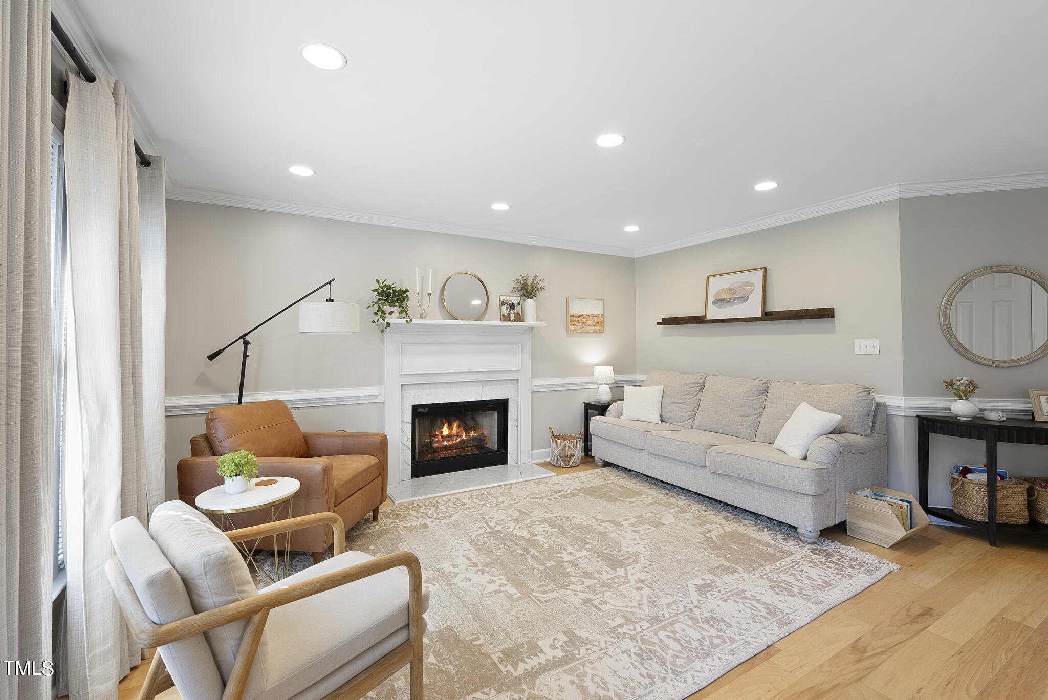 2821 Dahlgreen Road Raleigh, NC 27615 - Photo 8 of 28 a living room with furniture and a fireplace