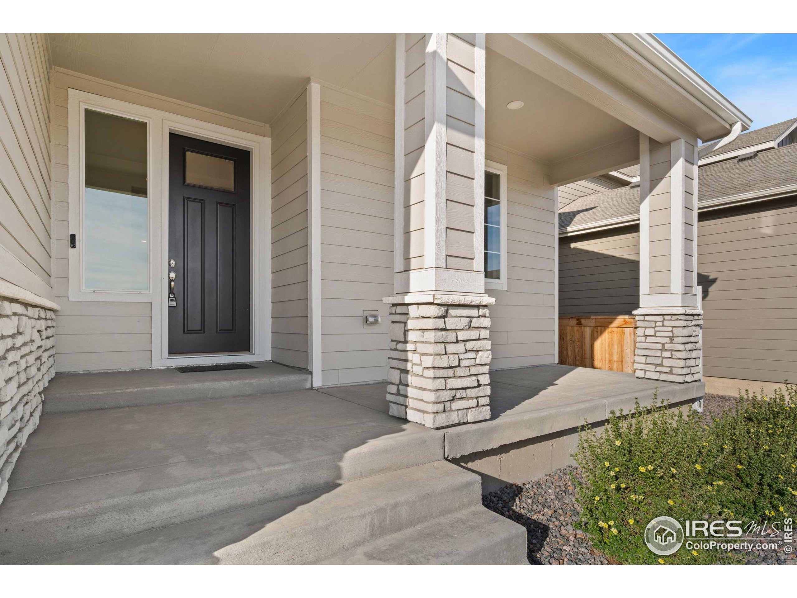 963 Milner Pass Road Severance, CO 80550 - Photo 3 of 42 a view of front door of house