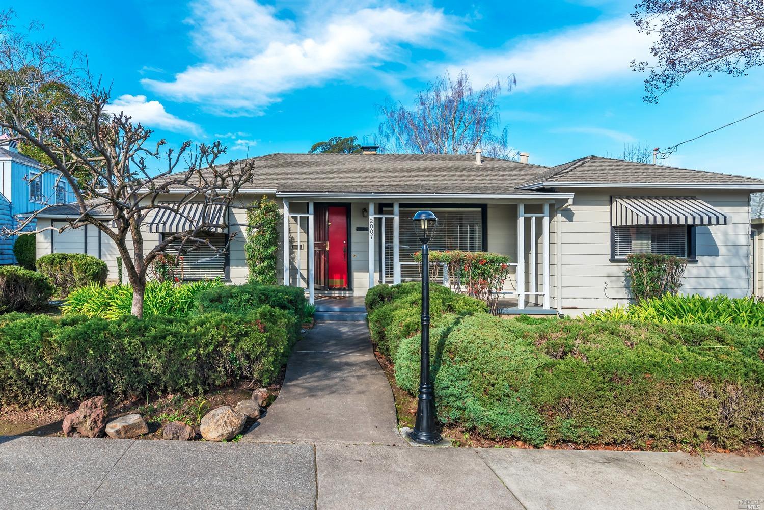 2007 Montecito Avenue Santa Rosa, CA 95404 - Photo 1 of 1 front view of a house with a garden