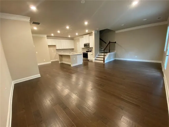 a view of a hallway with staircase