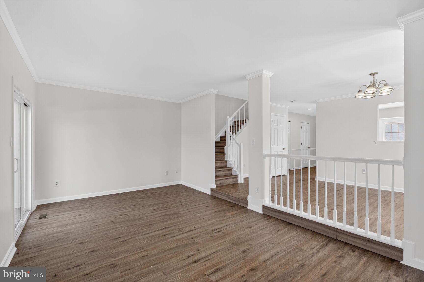 45544 Whitcomb Square Sterling, VA 20166 - Photo 7 of 31 Living Room with View to Dining Area
