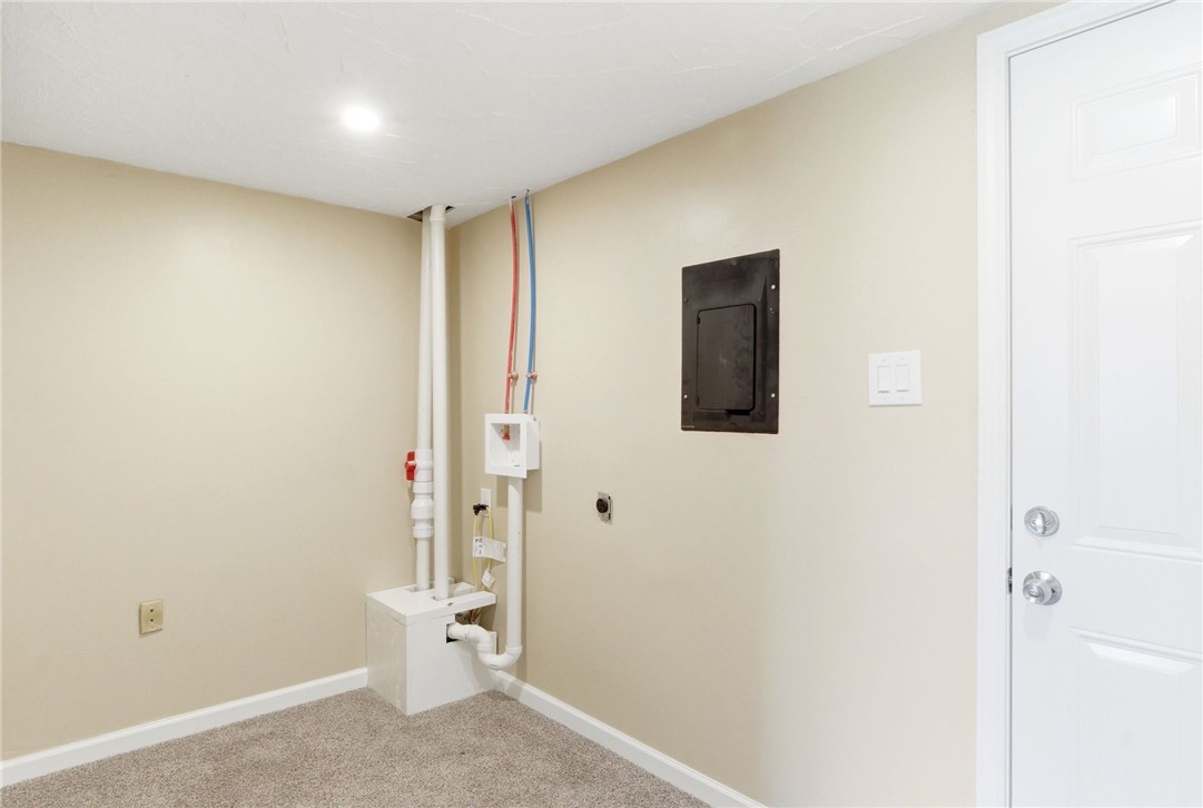 40 Woods Road Springboro, OH 45066 - Photo 49 of 57 This dedicated utility room offers convenient washer and dryer hookups with ample space.