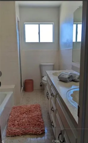 a bathroom with a sink and a bathtub