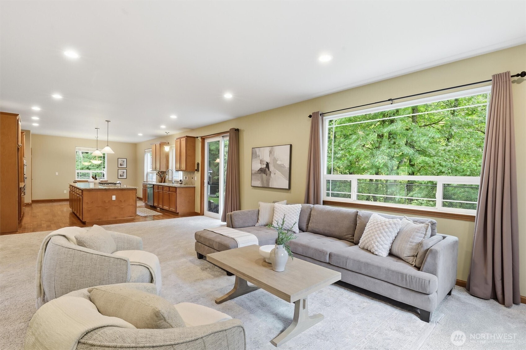 4202 Silvana Terrace Road Stanwood, WA 98292 - Photo 17 of 40 a living room with furniture and a large window