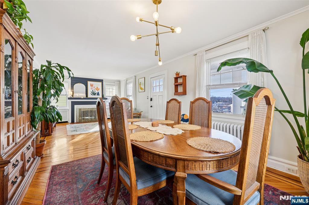 53 Forest Hill Road West Orange, NJ 07052 - Photo 12 of 40 a view of a dining room with furniture and wooden floor