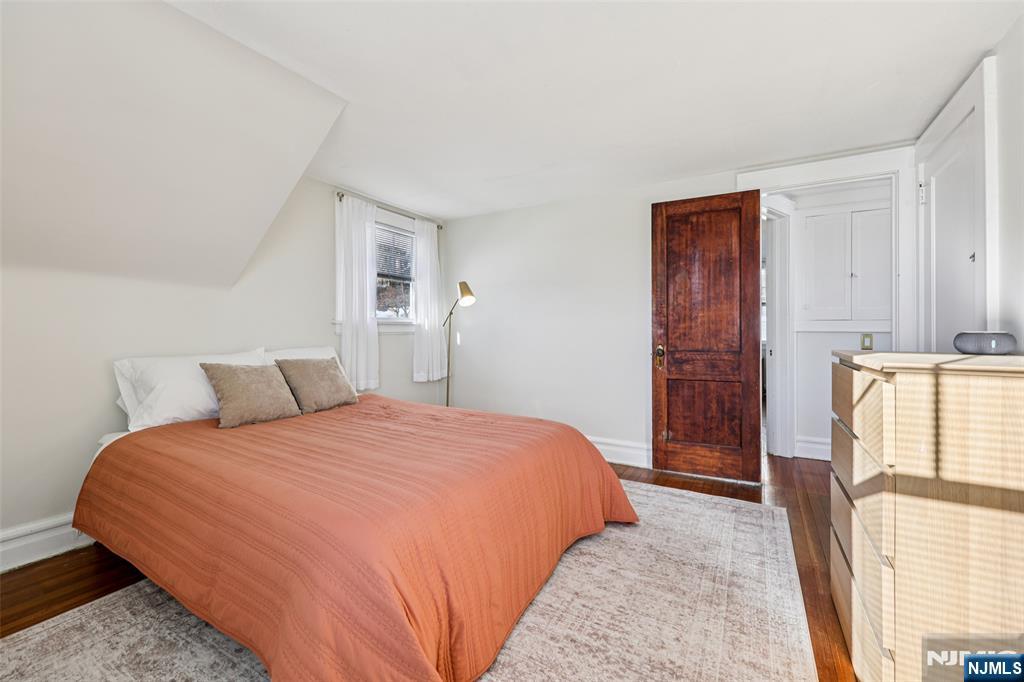 53 Forest Hill Road West Orange, NJ 07052 - Photo 22 of 40 a bedroom with a bed and a large window