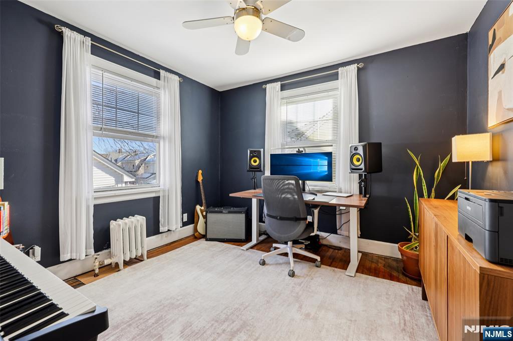 53 Forest Hill Road West Orange, NJ 07052 - Photo 27 of 40 a view of a workspace with furniture and a window