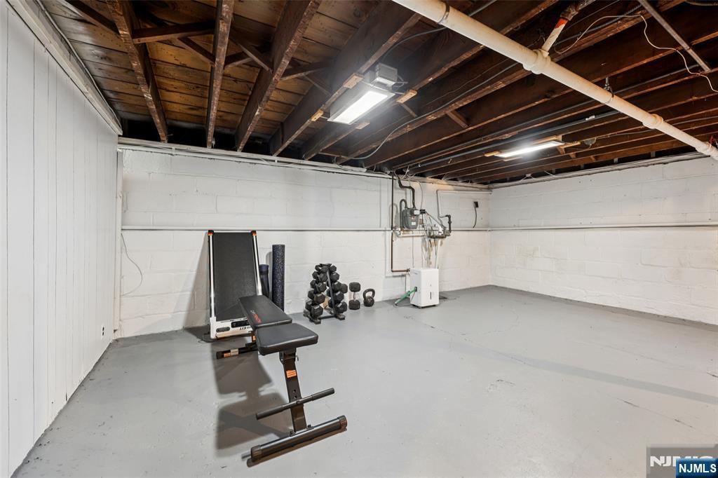 53 Forest Hill Road West Orange, NJ 07052 - Photo 29 of 40 a view of a room with gym equipment