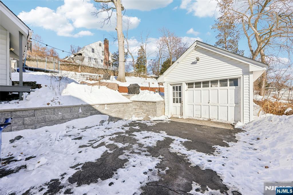53 Forest Hill Road West Orange, NJ 07052 - Photo 33 of 40 a view of a house with a snow in the yard