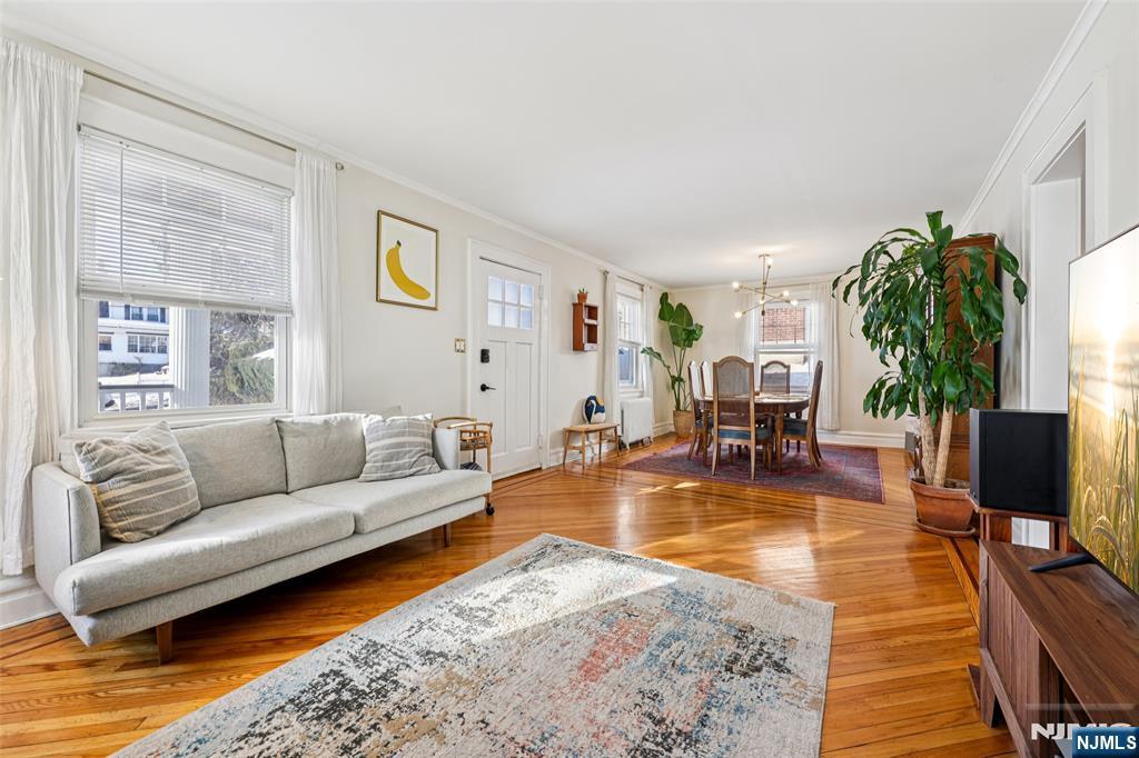 53 Forest Hill Road West Orange, NJ 07052 - Photo 9 of 40 a living room with furniture and a flat screen tv