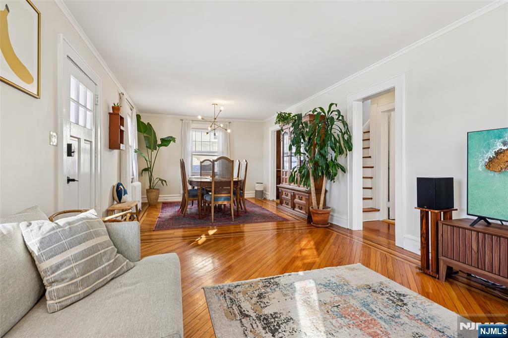 53 Forest Hill Road West Orange, NJ 07052 - Photo 10 of 40 a living room with furniture and a flat screen tv